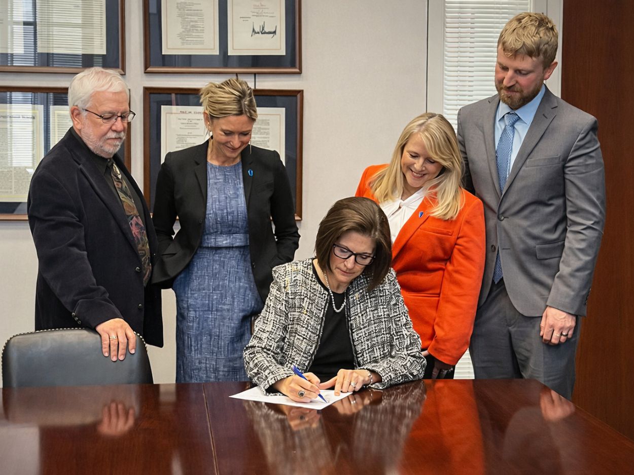 CEO, Darcie Collins Goodman, PhD, helping cut the green tape