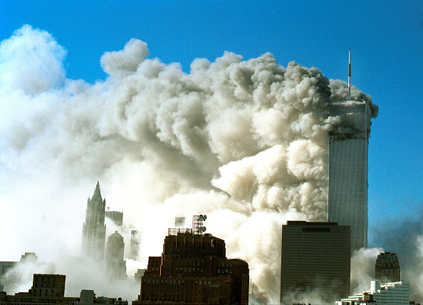 Smoke pours out of the World Trade Center after the twin towers were struck