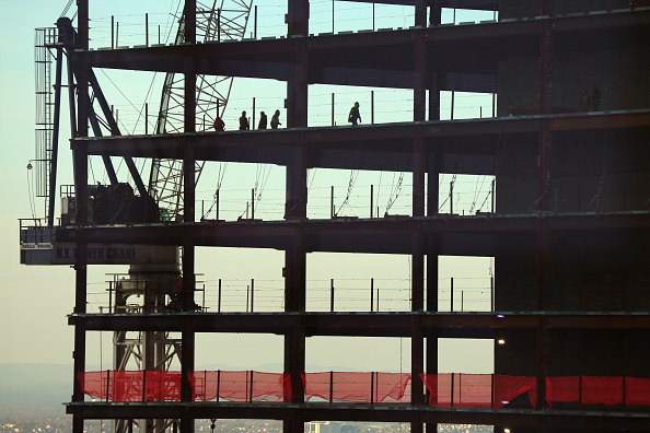 Construction workers work at 50 Hudson Yards on the west side of midtown Manhattan