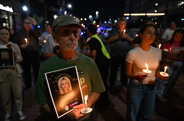 Hundreds gather as the Mecklenburg County Republican Party holds a candlelight vigil for Iryna Zarutska