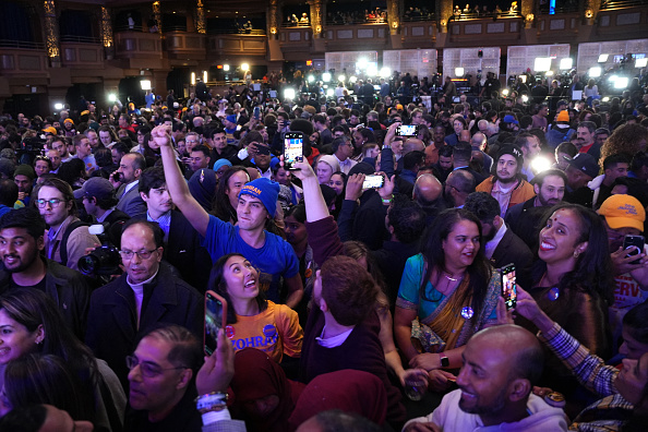 Supporters of Zohran Mamdani celebrate during an election night event at the Brooklyn Paramount Theater in Brooklyn, New York