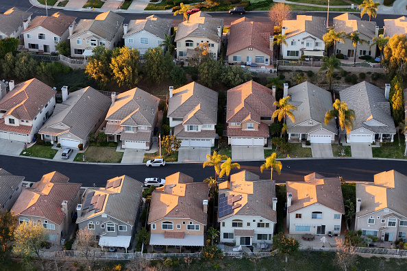 Two-story single-family homes line the streets of a neighborhood