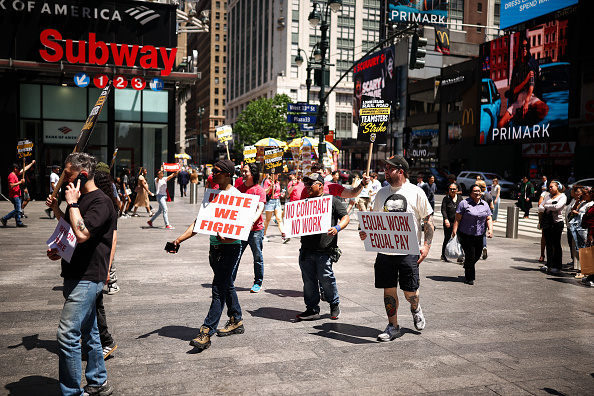 Long Island Rail Road workers picket in front of Penn Station in New York City