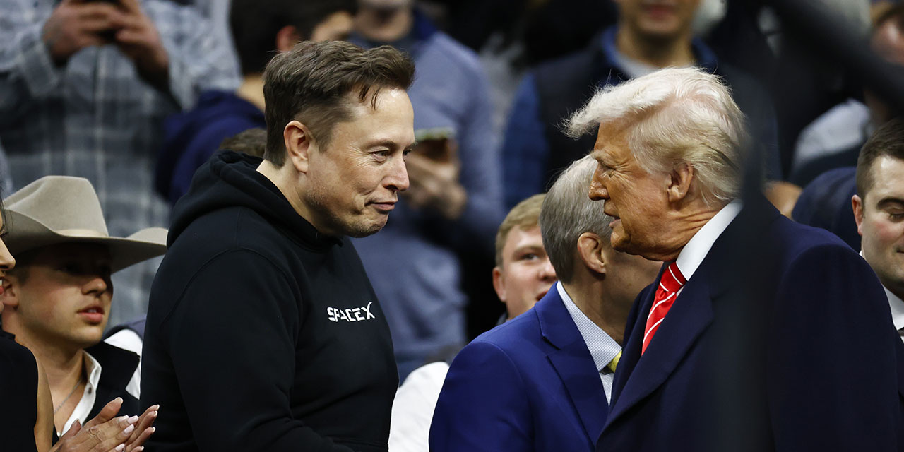 U.S. President Donald Trump greets Elon Musk during the Division I Men's Wrestling Championship held at the Wells Fargo Center on March 22, 2025 in Philadelphia, Pennsylvania.