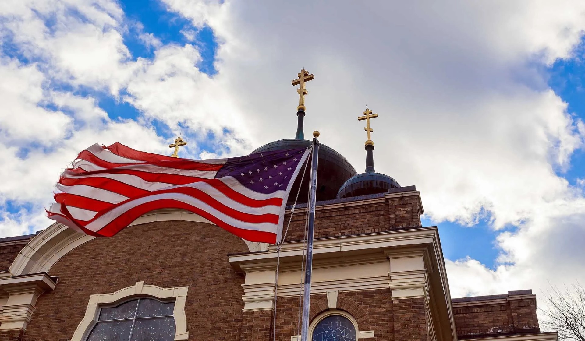 American flag and church